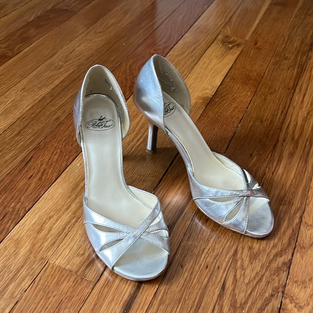 Silver d’orsay pumps.